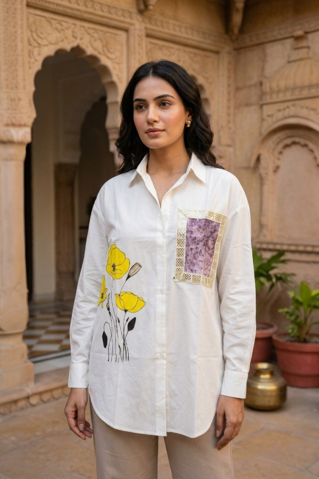 women wearing THE KESARIYA MEGH HANDPAINTED SHIRT, a rain inspired hand-painted cotton satin shirt from M R JAIPUR