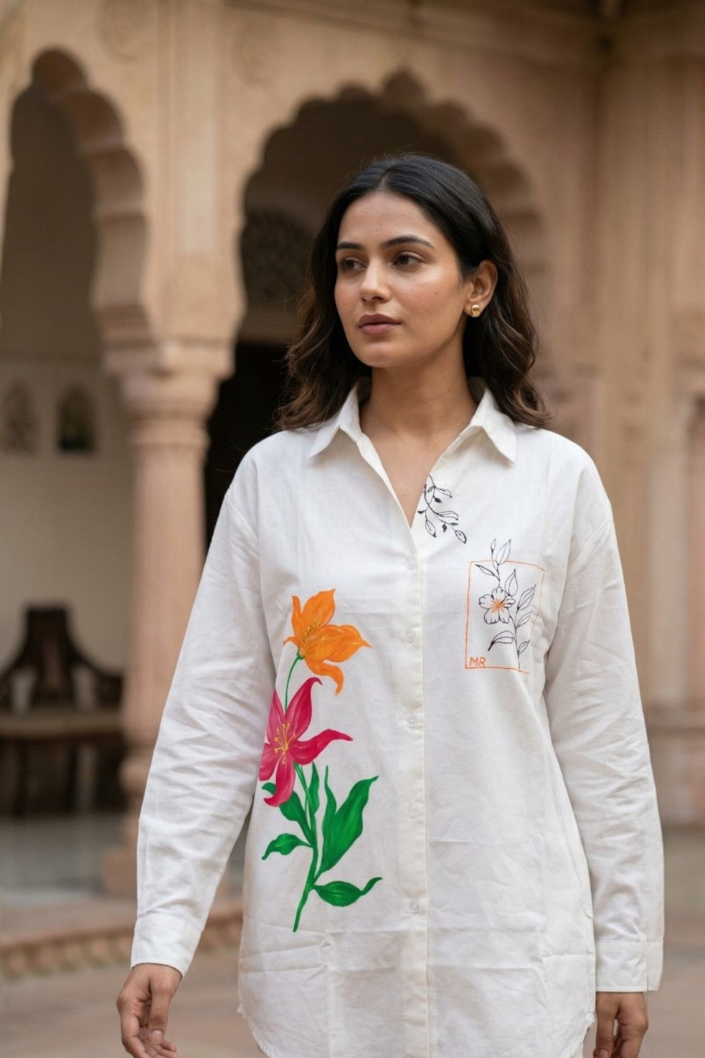 women wearing THE AMARIS HANDBLOCK SHIRT, a floral inspired hand-painted cotton satin shirt from M R JAIPUR