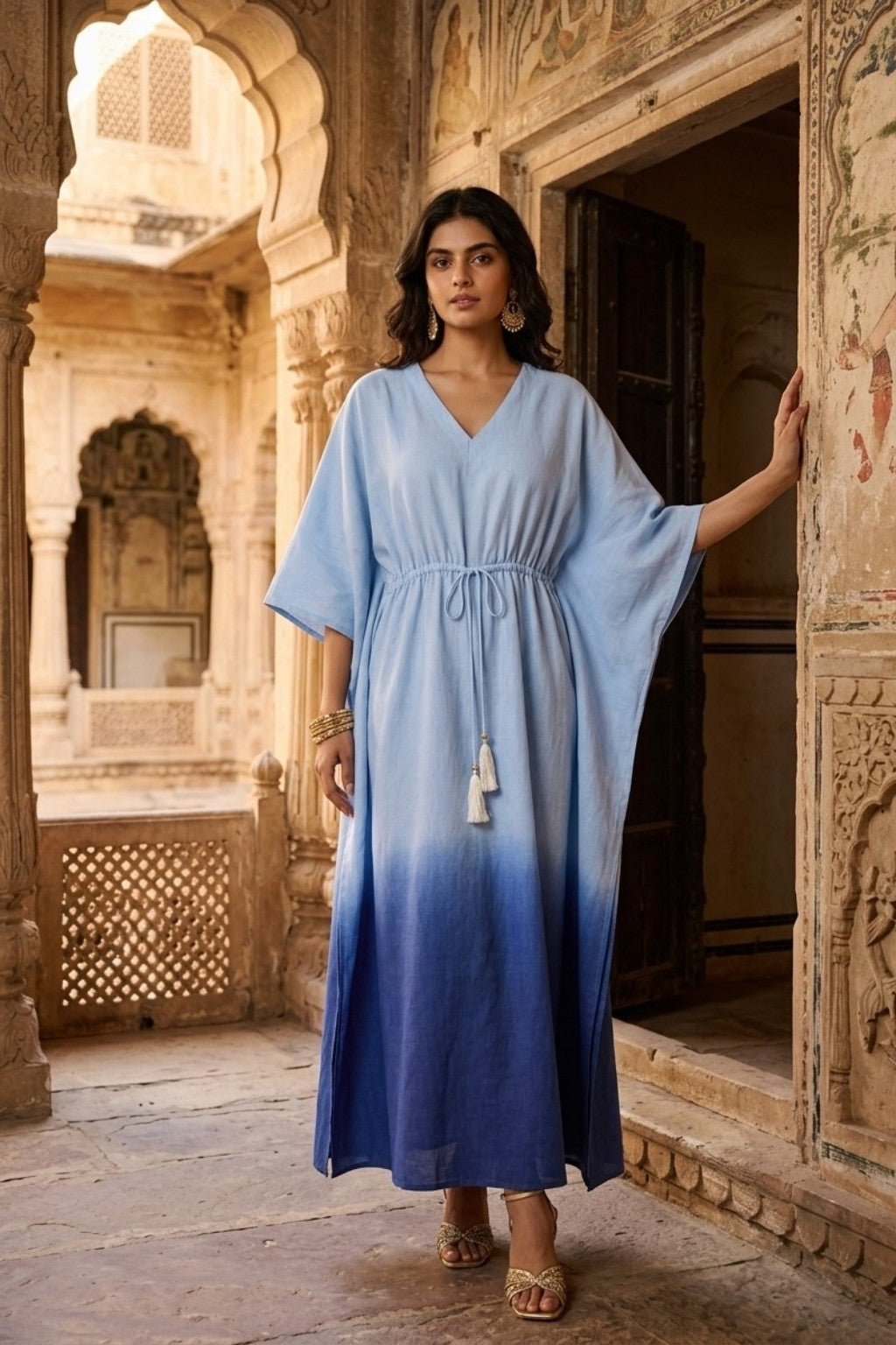 women wearing KAFTAN, a blue hand-dyed premium 100% Viscose/Silk Blend kaftan from M R JAIPUR