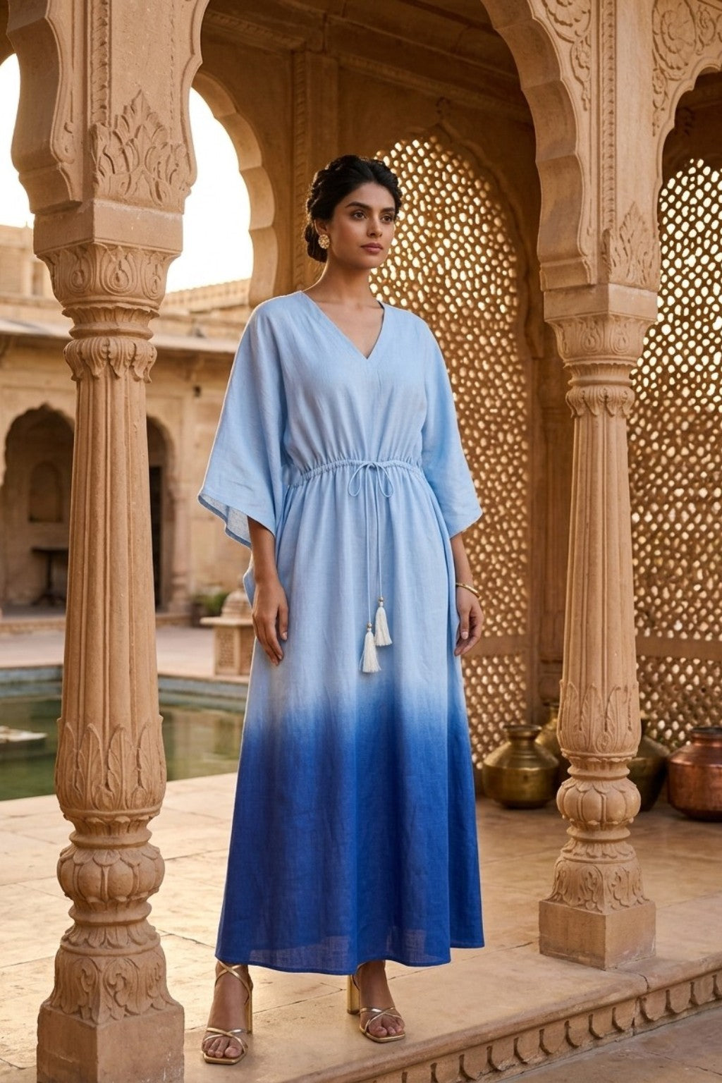 women wearing KAFTAN, a blue hand-dyed premium 100% Viscose/Silk Blend kaftan from M R JAIPUR