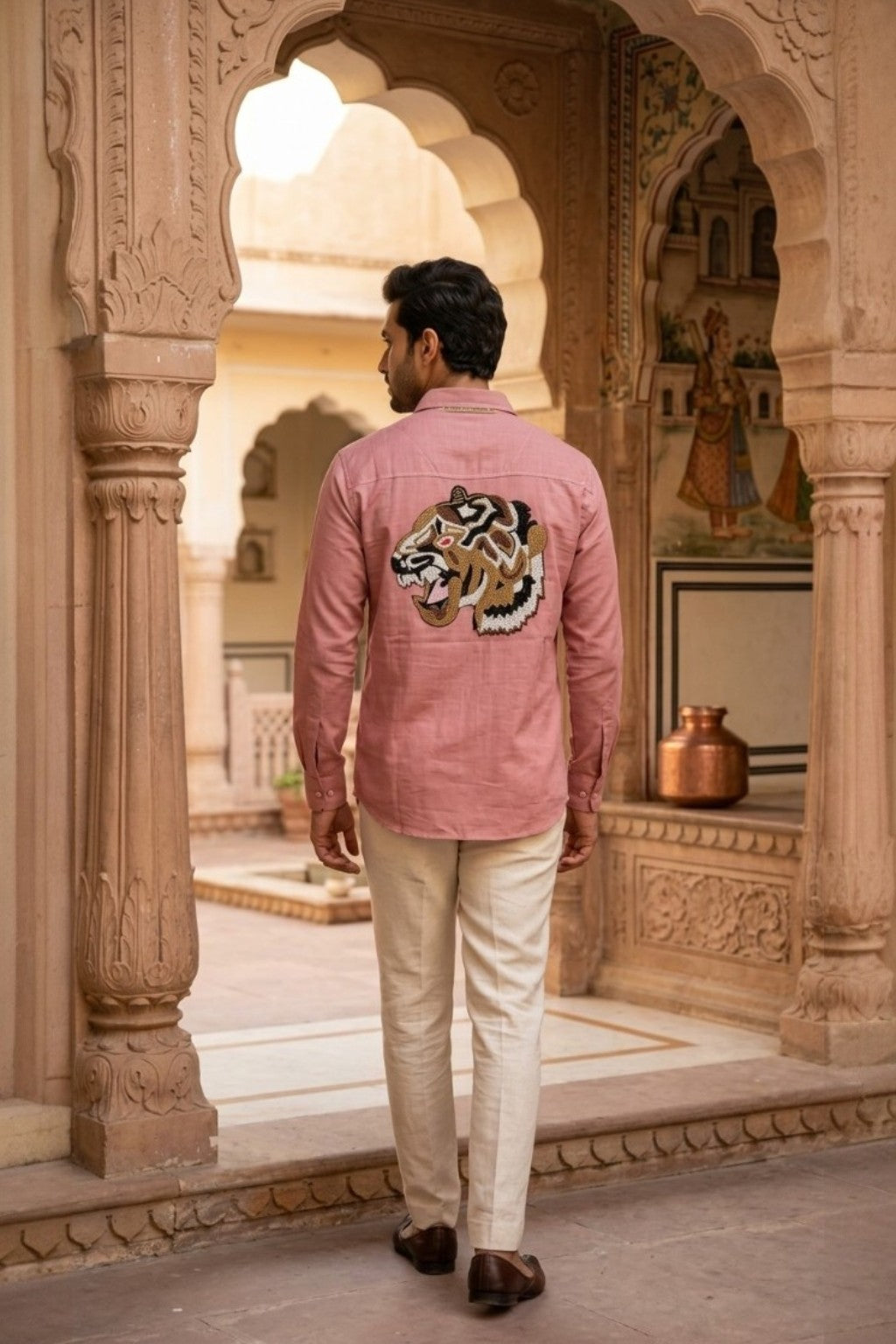 Man wearing JAIPUR TIGER MENS SHIRT, a TIGER hand-embroidered cotton-linen shirt from M R JAIPUR