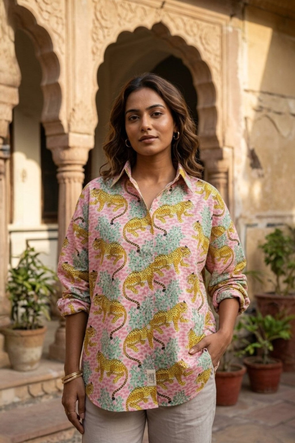 women wearing THE JHALANA LEOPARD HANDBLOCK SHIRT, a leopard inspired hand-block cotton shirt from M R JAIPUR