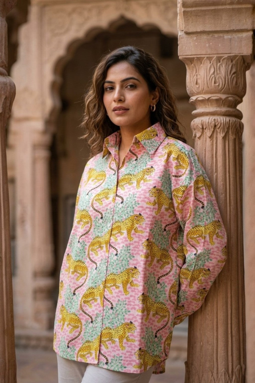 women wearing THE JHALANA LEOPARD HANDBLOCK SHIRT, a leopard inspired hand-block cotton shirt from M R JAIPUR