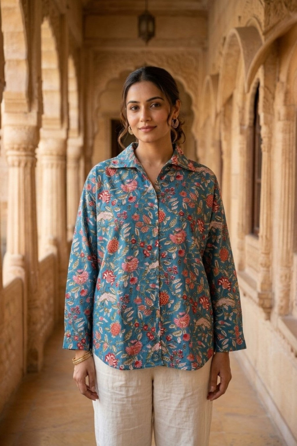 women wearing THE NEELBAGH HANDBLOCK SHIRT, a floral inspired hand-block cotton shirt from M R JAIPUR